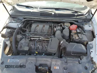 2015 Ford Taurus SEL z VIN 1FAHP2E8XFG181929, wystawiony jako Copart lot #64022325 z przebiegiem 106 272 mil mil oraz Szkoda całkowita • Salvage title. Historia ofert i sprzedaży dostępna na DreamBid. Obrazek 11.