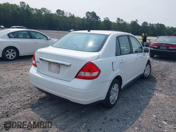 2010 Nissan Versa S with VIN 3N1BC1AP8AL415222, listed as a IAAI auction lot 42400894 with 124,129 mi miles and . Bid and sale history available at DreamBid. Image 4.