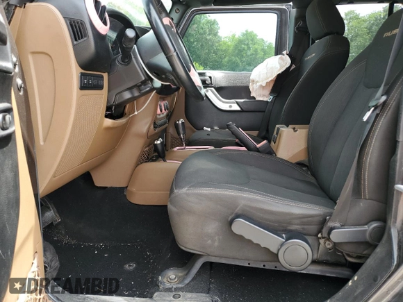 2017 Jeep Wrangler Unlimited Rubicon Recon with VIN 1C4HJWFG3HL510439, listed as a Copart auction lot 60791165 with 125,955 mi miles and Salvage title. Bid and sale history available at DreamBid. Image 7.