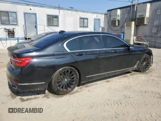 2016 BMW 7 Series 740i z VIN WBA7E2C58GG738940, wystawiony jako Copart lot #60503595 z przebiegiem 99 654 mil mil oraz Szkoda całkowita • Salvage title. Historia ofert i sprzedaży dostępna na DreamBid. Obrazek 3.