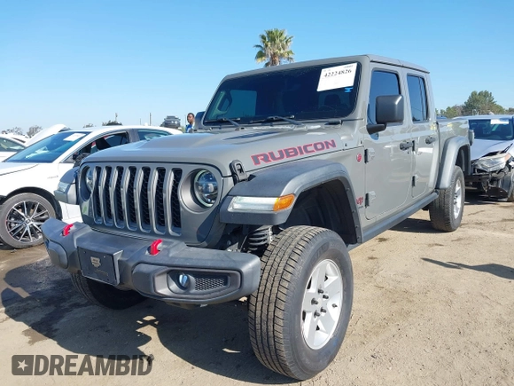 2020 Jeep Gladiator Rubicon with VIN 1C6JJTBG6LL149469, listed as a IAAI auction lot 42224826 with 58,870 mi miles and . Bid and sale history available at DreamBid. Image 2.
