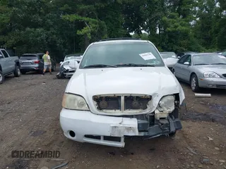 2004 Kia Sedona LX with VIN KNDUP131446493787, listed as a IAAI auction lot 40004348 with 168,374 mi miles. Bid and sale history available at carsss.com. Image 12.