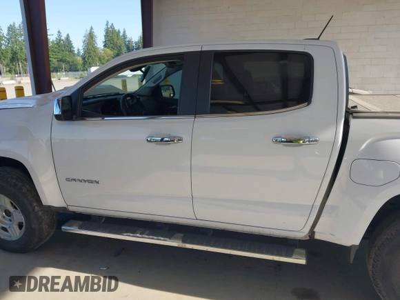 2015 GMC Canyon 2WD SLE with VIN 1GTG5CEA1F1273955, listed as a IAAI auction lot 42392908 with 79,981 mi miles and . Bid and sale history available at DreamBid. Image 14.