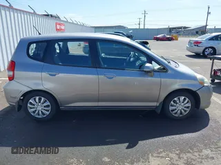 2007 Honda Fit with VIN JHMGD38437S003645, listed as a IAAI auction lot 42409925 with 166,481 mi miles and . Bid and sale history available at DreamBid. Image 13.