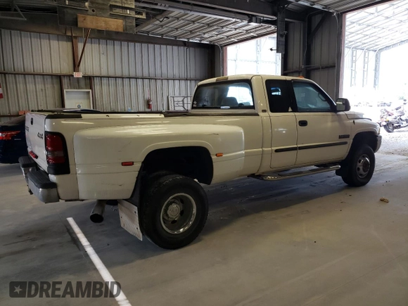 2002 Dodge Ram 3500 with VIN 3B7MF33C02M204269, listed as a Copart auction lot 68442394 with 238,041 mi miles and Salvage Title. Bid and sale history available at carsss.com. Image 3.