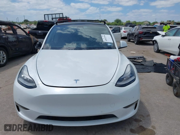 2021 Tesla Model Y Performance with VIN 5YJYGDEF9MF081798, listed as a IAAI auction lot 42033358 with 64,679 mi miles and . Bid and sale history available at DreamBid. Image 13.