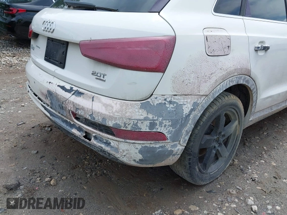 2015 Audi Q3 Premium Plus z VIN WA1EFCFS8FR001278, wystawiony jako IAAI lot #42475043 z przebiegiem 125 417 mil mil oraz . Historia ofert i sprzedaży dostępna na DreamBid. Obrazek 6.