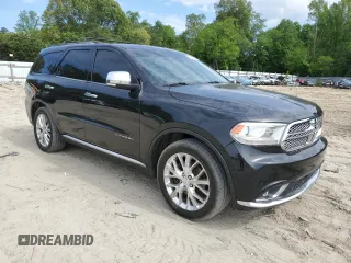 2014 Dodge Durango Citadel z VIN 1C4SDJET6EC267350, wystawiony jako Copart lot #56128585 z przebiegiem 259 339 mil mil oraz Szkoda całkowita • Salvage title. Historia ofert i sprzedaży dostępna na DreamBid. Obrazek 4.