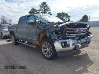 2015 GMC Sierra 1500 SLT with VIN 3GTU2VEC4FG433773, listed as a IAAI auction lot 41464687 with 160,876 mi miles and . Bid and sale history available at DreamBid. Image 1.