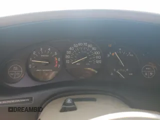 1999 Buick Regal LS with VIN 2G4WB52K2X1632136, listed as a Copart auction lot 50306905 with 0 mi miles and Salvage Title. Bid and sale history available at carsss.com. Image 9.