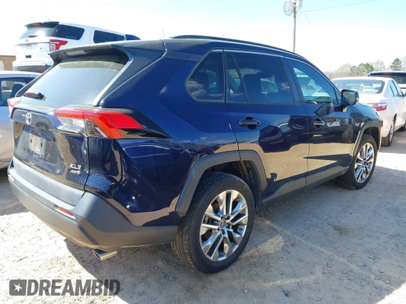 2019 Toyota RAV4 XLE Premium with VIN 2T3A1RFV4KW078806, listed as a IAAI auction lot 41877504 with 99,017 mi miles. Bid and sale history available at carsss.com. Image 4.