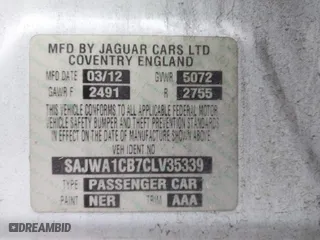 2012 Jaguar XJ with VIN SAJWA1CB7CLV35339, listed as a IAAI auction lot 41945850 with 123,501 mi miles. Bid and sale history available at carsss.com. Image 9.