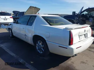 2001 Cadillac Eldorado Touring ETC z VIN 1G6ET12991B104624, wystawiony jako IAAI lot #41616324 z przebiegiem Nie podano mil oraz . Historia ofert i sprzedaży dostępna na DreamBid. Obrazek 3.