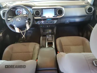 2023 Toyota Tacoma SR z VIN 3TMCZ5AN4PM599664, wystawiony jako Copart lot #57462455 z przebiegiem 65 736 mil mil oraz Szkoda całkowita • Salvage title. Historia ofert i sprzedaży dostępna na DreamBid. Obrazek 8.
