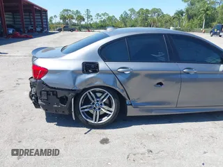 2013 BMW 5 Series 550i xDrive with VIN WBAFU9C54DDY72137, listed as a IAAI auction lot 41794124 with 58,647 mi miles and . Bid and sale history available at carsss.com. Image 6.