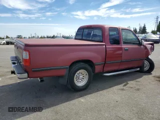 1996 Toyota T100 SR5 z VIN JT4TN14D7T0017707, wystawiony jako Copart lot #75676624 z przebiegiem 246 564 mil mil oraz Szkody całkowita. Historia ofert i sprzedaży dostępna na DreamBid. Obrazek 3.