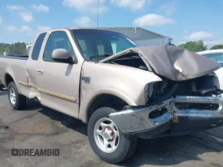 1998 Ford F-150 z VIN 1FTZX18W5WKC23097, wystawiony jako IAAI lot #42569615 z przebiegiem 177 002 mil mil oraz . Historia ofert i sprzedaży dostępna na DreamBid. Obrazek 1.