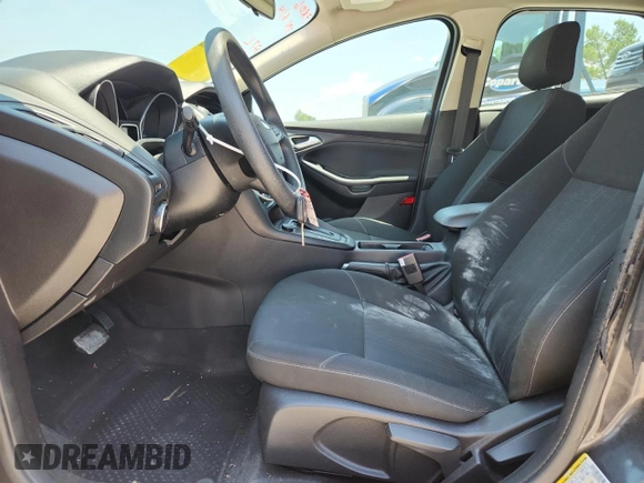 2018 Ford Focus SE with VIN 1FADP3F25JL331038, listed as a Copart auction lot 60235395 with 37,038 mi miles and Salvage title. Bid and sale history available at DreamBid. Image 7.