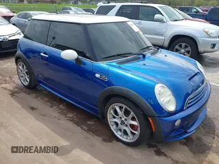 2006 MINI Hardtop S z VIN WMWRE33596TL23436, wystawiony jako IAAI lot #42011749 z przebiegiem 73 381 mil mil oraz . Historia ofert i sprzedaży dostępna na DreamBid. Obrazek 1.