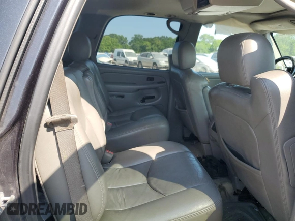 2004 Chevrolet Tahoe LT with VIN 1GNEC13ZX4J304070, listed as a Copart auction lot 59779655 with 123,241 mi miles and Salvage title. Bid and sale history available at DreamBid. Image 11.