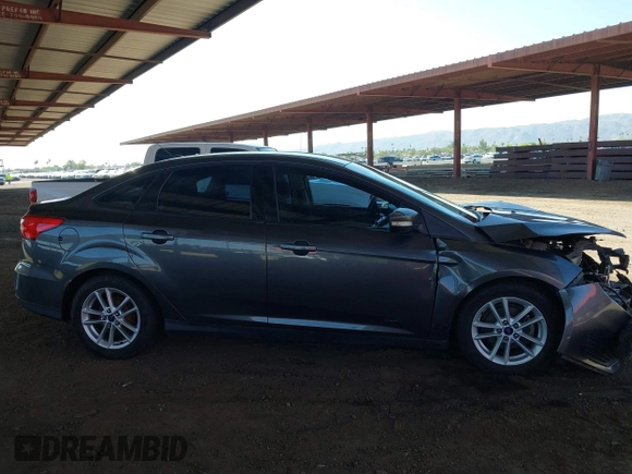 2015 Ford Focus SE z VIN 1FADP3F21FL210742, wystawiony jako IAAI lot #42418476 z przebiegiem 155 829 mil mil oraz . Historia ofert i sprzedaży dostępna na DreamBid. Obrazek 13.