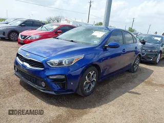 2021 Kia Forte LXS with VIN 3KPF24AD5ME384836, listed as a IAAI auction lot 42098713 with 29,107 mi miles and . Bid and sale history available at DreamBid. Image 2.