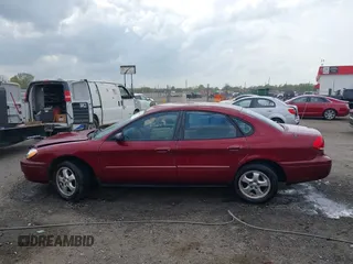 2004 Ford Taurus SES with VIN 1FAFP55284G188993, listed as a IAAI auction lot 41895733 with Not Provided miles and . Bid and sale history available at DreamBid. Image 14.