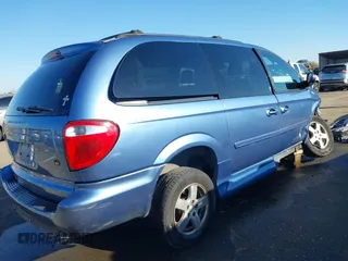 2007 Dodge Grand Caravan SXT with VIN 2D4GP44LX7R313906, listed as a IAAI auction lot 41402653 with 82,315 mi miles and . Bid and sale history available at DreamBid. Image 4.