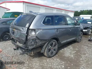 2017 Mitsubishi Outlander SE with VIN JA4AD3A35HZ057699, listed as a IAAI auction lot 42337414 with 85,950 mi miles and . Bid and sale history available at DreamBid. Image 4.