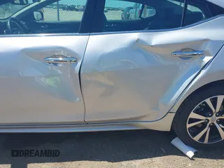 2016 Nissan Maxima SV z VIN 1N4AA6AP4GC434730, wystawiony jako IAAI lot #42231308 z przebiegiem 42 239 mil mil oraz . Historia ofert i sprzedaży dostępna na DreamBid. Obrazek 6.