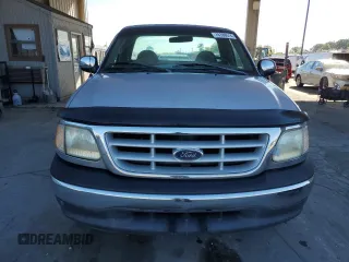 1999 Ford F-150 XL with VIN 1FTRF17L7XNA73732, listed as a Copart auction lot 74388514 with Not provided miles and Clean title. Bid and sale history available at DreamBid. Image 5.