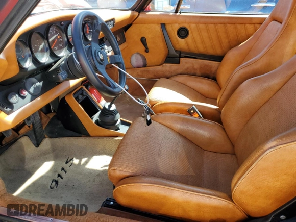 1977 Porsche 911 with VIN 9117200797, listed as a Copart auction lot 49103365 with 145,827 mi miles and Salvage title. Bid and sale history available at DreamBid. Image 7.