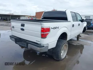2014 Ford F-150 XL with VIN 1FTFW1EF8EKD10436, listed as a IAAI auction lot 41903297 with 209,929 mi miles. Bid and sale history available at carsss.com. Image 4.
