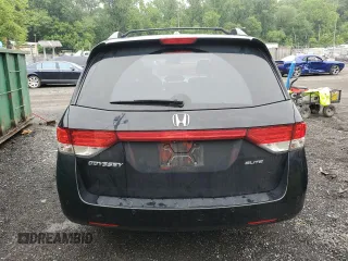 2016 Honda Odyssey Touring Elite with VIN 5FNRL5H90GB061827, listed as a Copart auction lot 61271695 with Not provided miles and Salvage title. Bid and sale history available at DreamBid. Image 6.