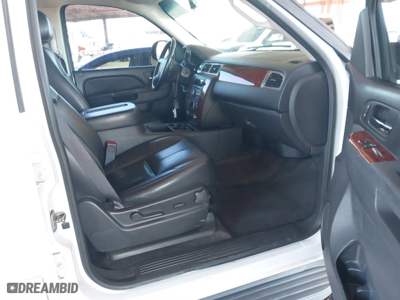 2012 Chevrolet Suburban LT with VIN 1GNSCJE05CR318556, listed as a IAAI auction lot 41654002 with 222,329 mi miles. Bid and sale history available at carsss.com. Image 5.