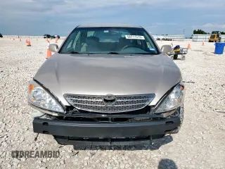 2004 Toyota Camry LE with VIN 4T1BE32K14U329066, listed as a Copart auction lot 60711515 with 178,144 mi miles and Salvage title. Bid and sale history available at DreamBid. Image 5.
