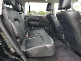 2018 Nissan Armada SL z VIN JN8AY2NC1JX502296, wystawiony jako Copart lot #53389055 z przebiegiem 129 237 mil mil oraz Czysty tytuł • Clean title. Historia ofert i sprzedaży dostępna na DreamBid. Obrazek 11.