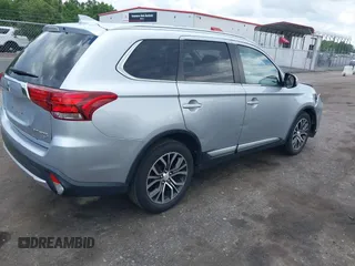 2017 Mitsubishi Outlander SE with VIN JA4AD3A31HZ050863, listed as a IAAI auction lot 42528872 with 98,136 mi miles and . Bid and sale history available at DreamBid. Image 4.