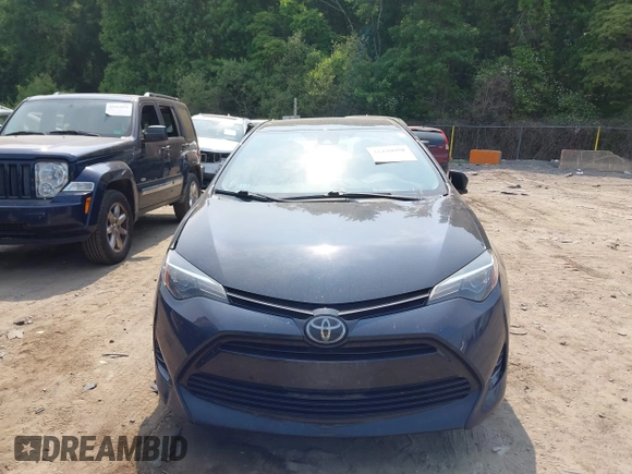 2018 Toyota Corolla L with VIN 2T1BURHE1JC052651, listed as a IAAI auction lot 42430958 with 104,664 mi miles and . Bid and sale history available at DreamBid. Image 12.