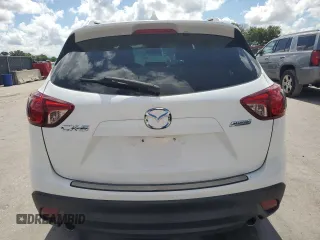 2015 Mazda CX-5 Sport z VIN JM3KE2BE6F0546994, wystawiony jako Copart lot #61948075 z przebiegiem 111 845 mil mil oraz Czysty tytuł • Clean title. Historia ofert i sprzedaży dostępna na DreamBid. Obrazek 6.