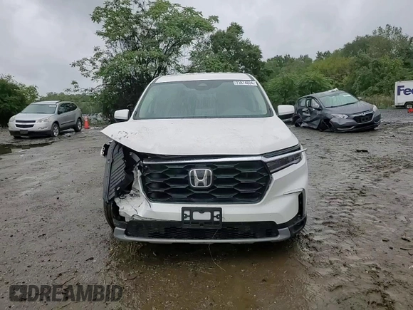 2023 Honda Pilot EX-L 7 Passenger with VIN 5FNYG1H58PB027415, listed as a Copart auction lot 73874824 with 17,261 mi miles and Salvage Title. Bid and sale history available at carsss.com. Image 12.