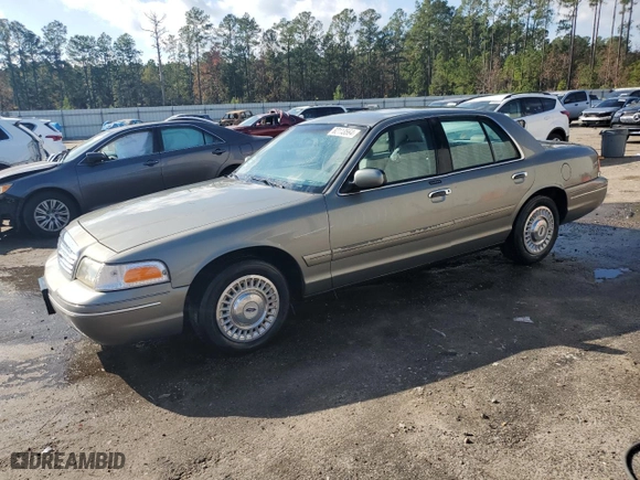 2000 Ford Crown Victoria with VIN 2FAFP73W0YX173874, listed as a Copart auction lot 82113564 with 108,425 mi miles and Salvage Title. Bid and sale history available at carsss.com. Image 1.