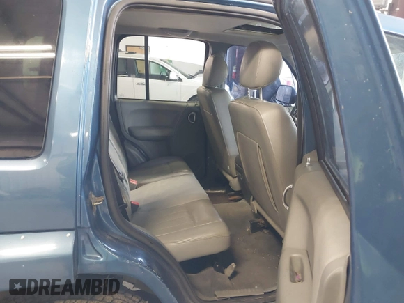 2004 Jeep Liberty Limited with VIN 1J4GK58K84W226666, listed as a IAAI auction lot 41764238 with 148,664 mi miles. Bid and sale history available at carsss.com. Image 8.