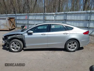 2018 Ford Fusion SE z VIN 3FA6P0H77JR226390, wystawiony jako IAAI lot #42120981 z przebiegiem 114 057 mil mil oraz . Historia ofert i sprzedaży dostępna na DreamBid. Obrazek 15.