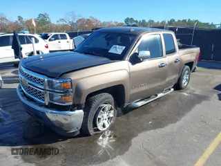 2014 Chevrolet Silverado 1500 LT with VIN 1GCRCREH5EZ165367, listed as a IAAI auction lot 41076729 with 130,425 mi miles and . Bid and sale history available at DreamBid. Image 17.