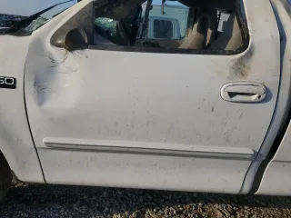 2000 Ford F-150 XL with VIN 1FTZF1727YKB49797, listed as a Copart auction lot 62154595 with Not provided miles and Salvage title. Bid and sale history available at DreamBid. Image 7.