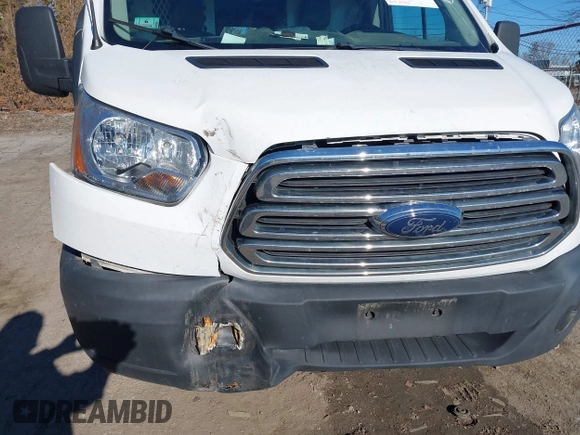 2015 Ford Transit Cargo with VIN 1FTNR1ZM6FKA65780, listed as a IAAI auction lot 41682836 with 144,338 mi miles and . Bid and sale history available at DreamBid. Image 6.