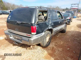 2000 GMC Jimmy SLE Convenience with VIN 1GKDT13W8Y2168245, listed as a IAAI auction lot 41348643 with 285,714 mi miles. Bid and sale history available at carsss.com. Image 4.