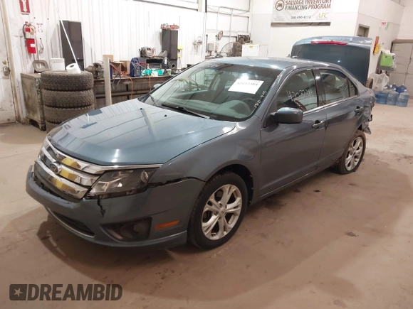 2012 Ford Fusion SE z VIN 3FAHP0HA9CR180004, wystawiony jako IAAI lot #42037384 z przebiegiem 111 262 mil mil oraz . Historia ofert i sprzedaży dostępna na DreamBid. Obrazek 17.