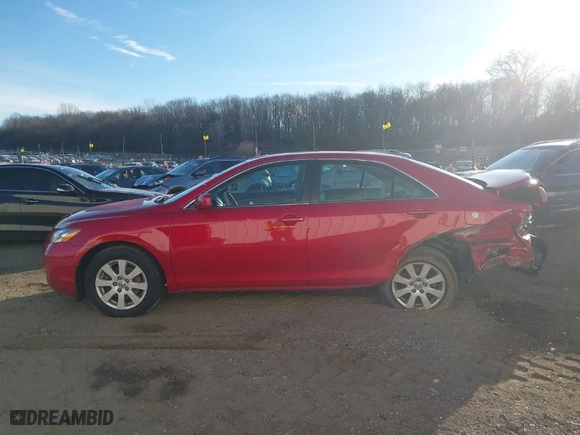 2007 Toyota Camry CE with VIN 4T1BE46K67U010279, listed as a IAAI auction lot 41504065 with 297,916 mi miles. Bid and sale history available at carsss.com. Image 14.